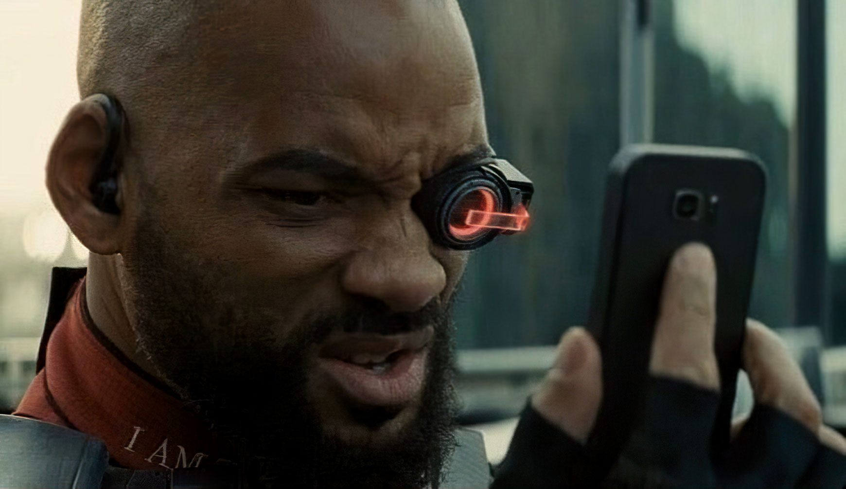 Will Smith looking at his phone