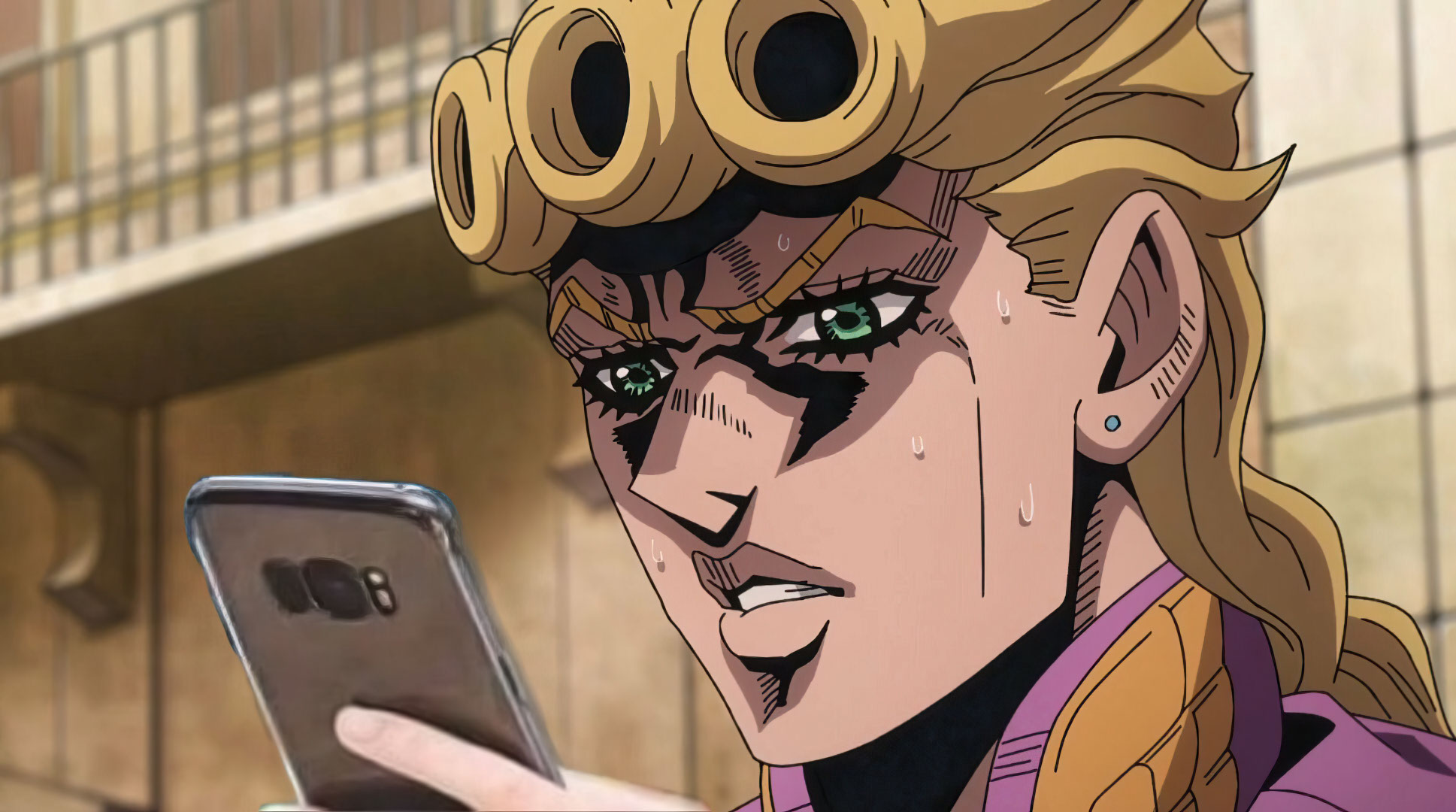Giorno looking at his phone